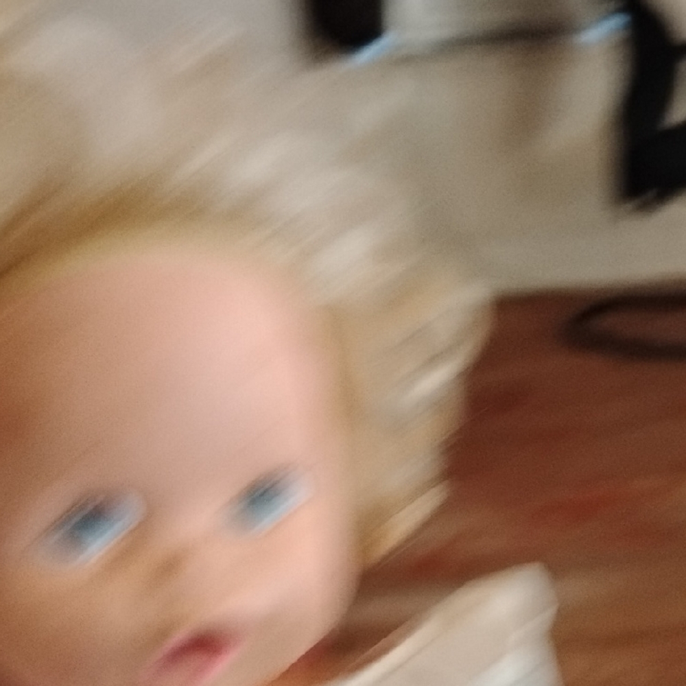 Delightful Blonde Doll with Blue Eyes
